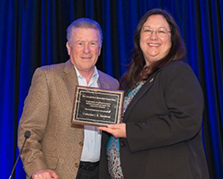 CPUC Commissioner Catherine J. K. Sandoval Accepting the Carmel River Watershed Conservancy Award from Executive Director Lorin Letendre