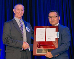 Outgoing CWA President Greg Milleman Accepting a Plaque of Appreciation from 2017-18 CWA President Lawrence Morales